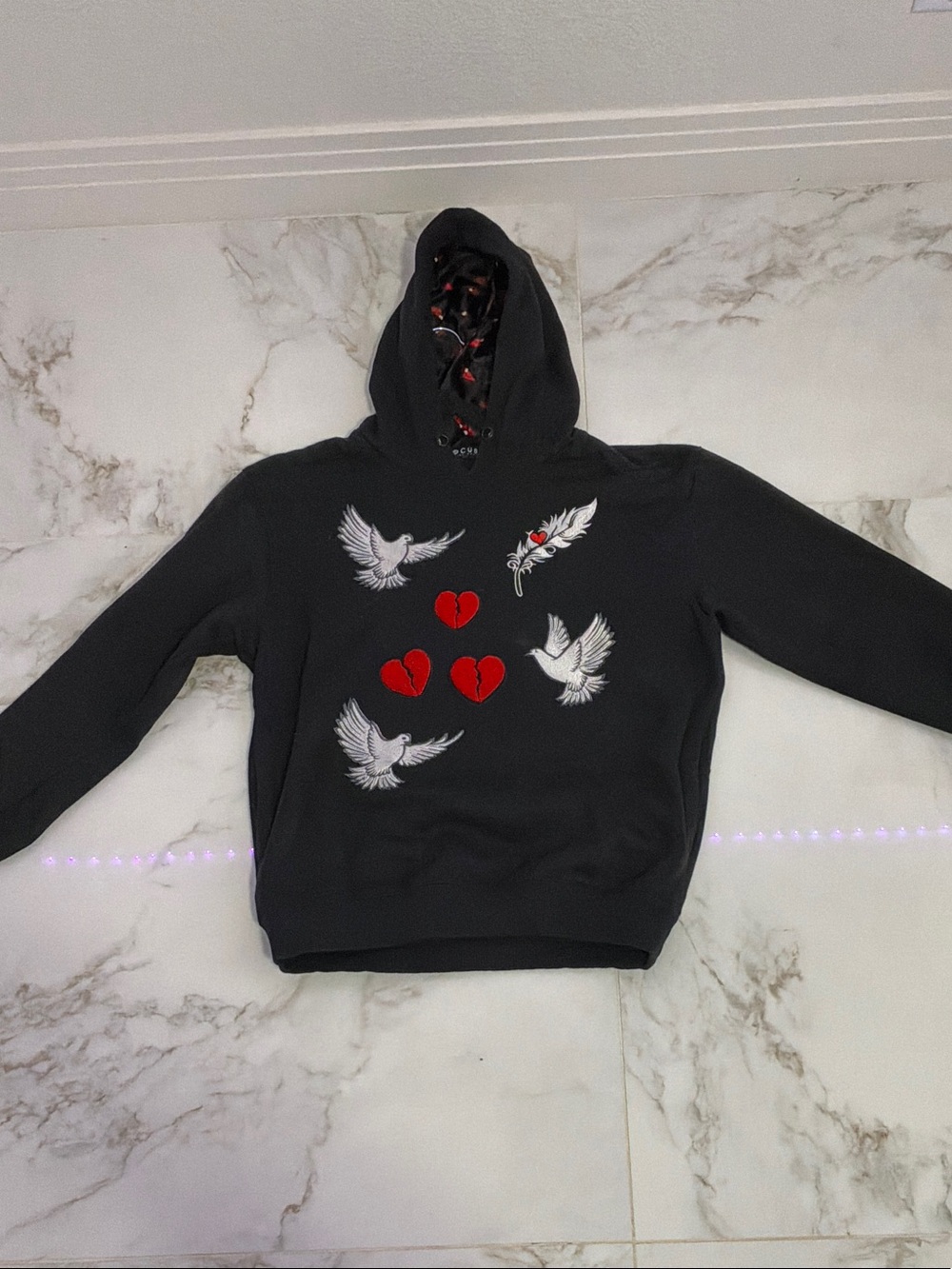 Black Hoodie with White Dove and Red Heart Graphic